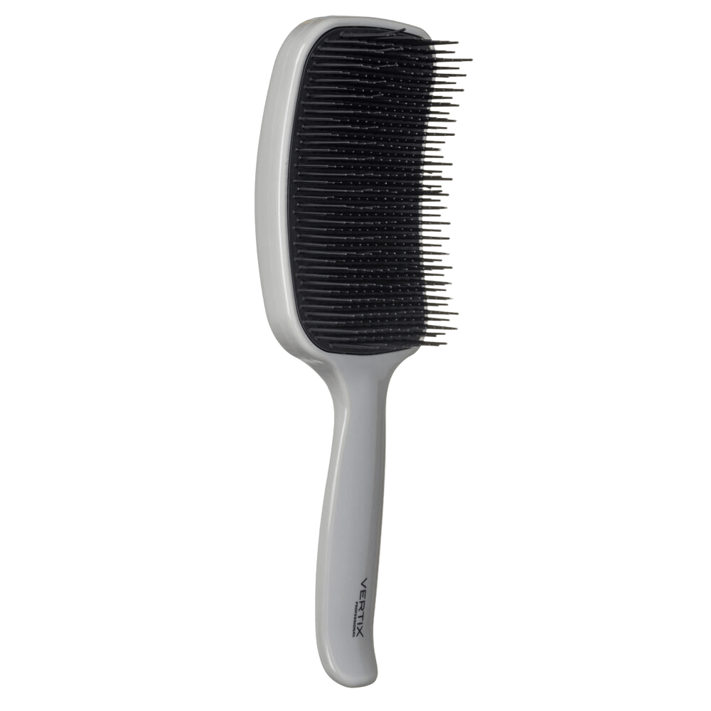 Escova Vertix Flex Pro em ângulo mostrando cerdas arredondadas e base espessa