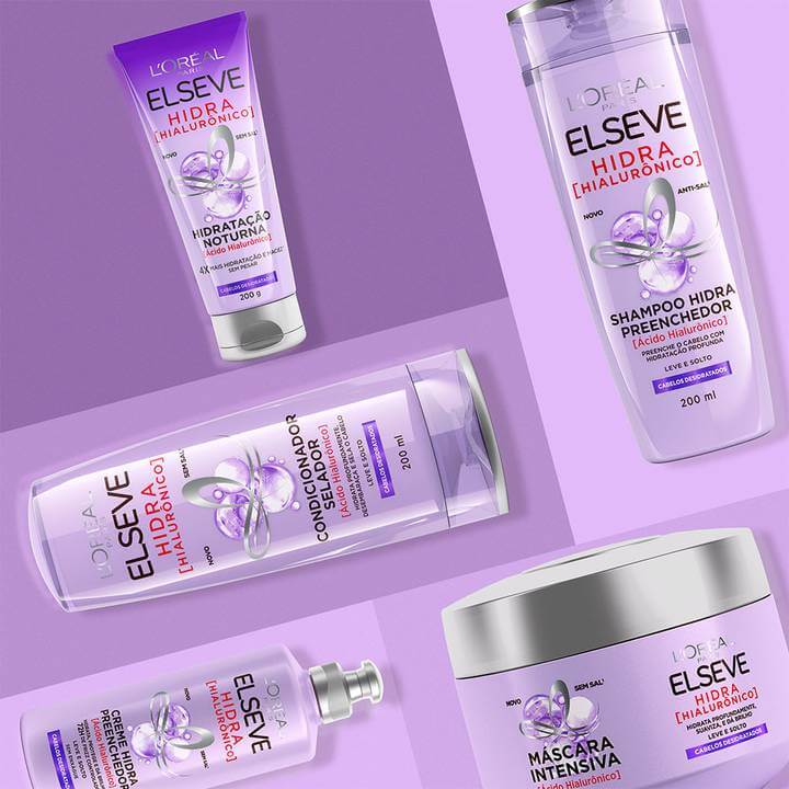 Linha Hidra Hialurônico com máscara 300g e demais produtos em fundo roxo claro