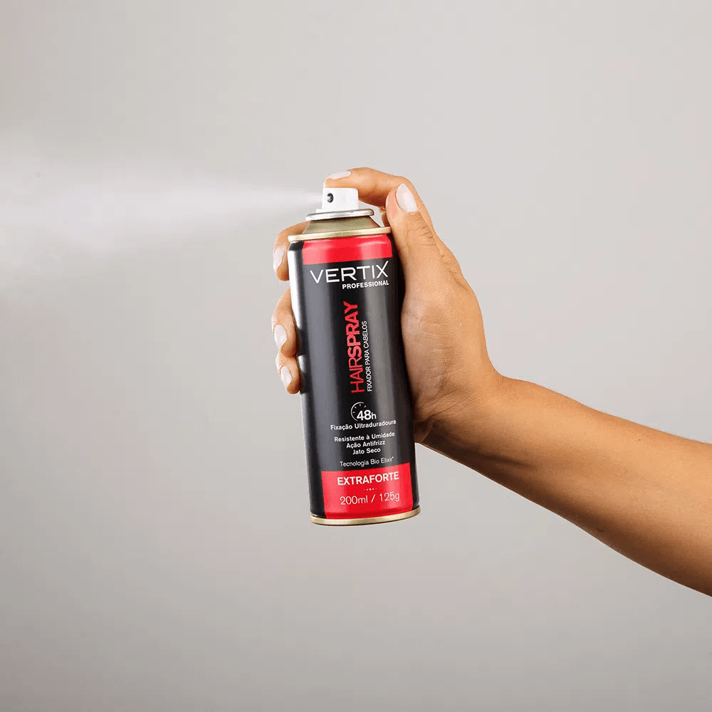 Detalhe do spray Vertix Extra Forte sendo acionado