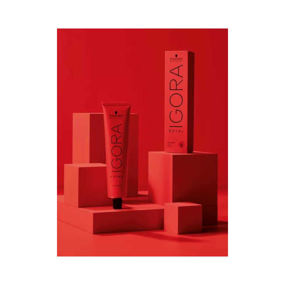 Produto Igora Royal 60g em tubo vermelho sobre pedestal, destacando embalagem e marca