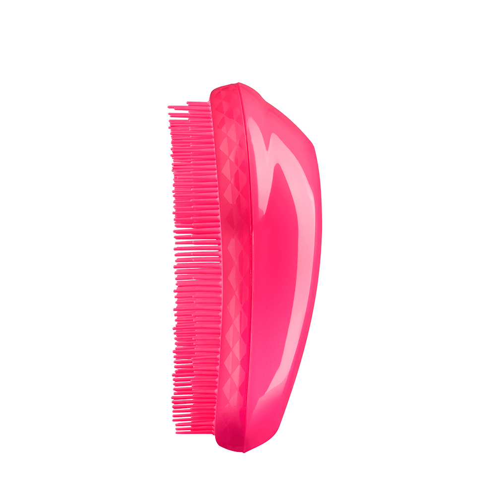 Vista lateral da Escova Tangle Teezer The Original Pink mostrando cerdas e corpo curvado