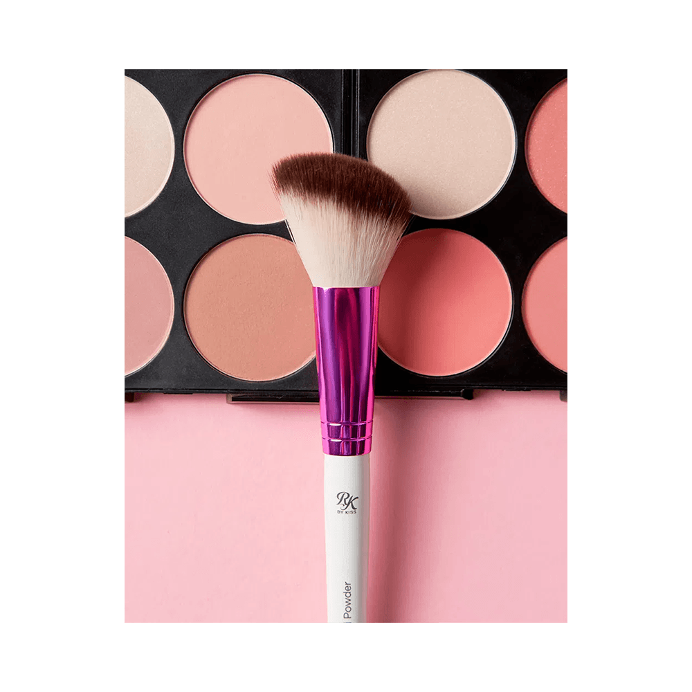Paleta aberta com pincel mostrando textura e cores dos blushes