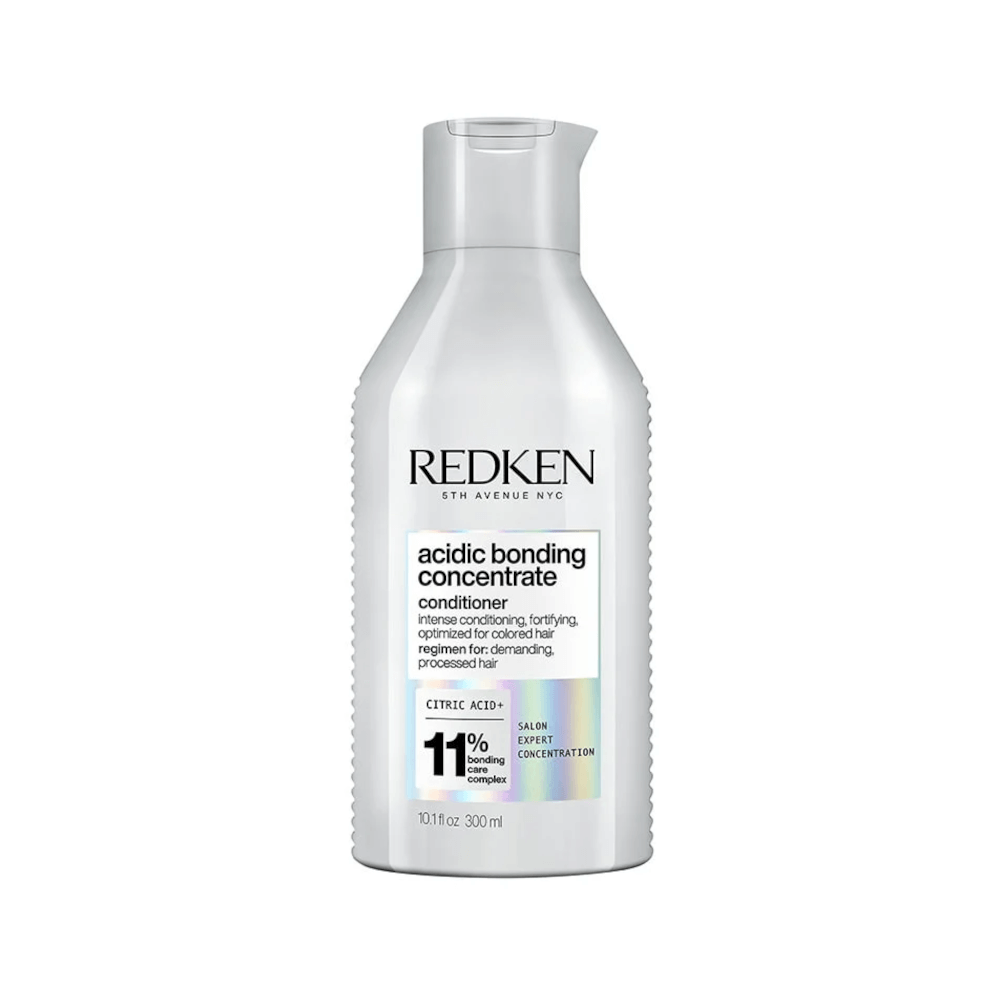 Frontal do condicionador Redken Acidic Bonding Concentrate 300ml em embalagem branca prateada fosca