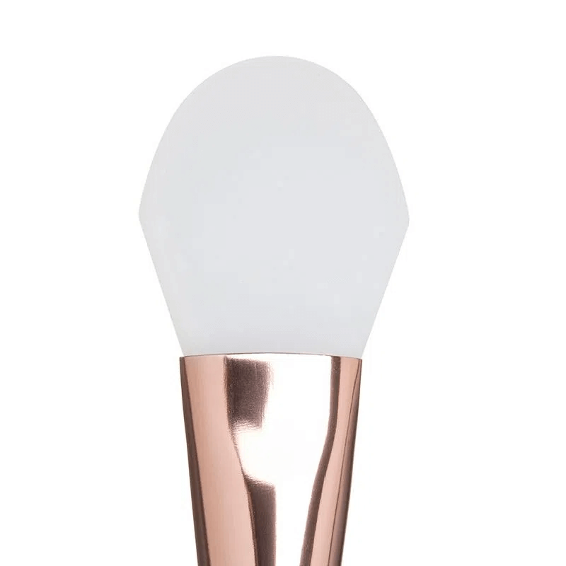 Close da ponta de silicone branca arredondada do Pincel Ricca Rose Gold