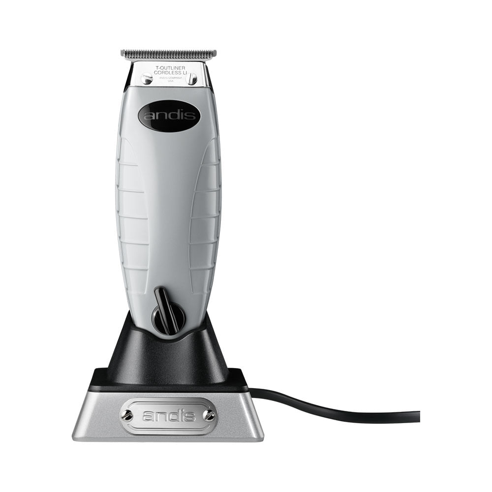 Andis T-Outliner posicionada mostrando lâmina T e corpo ergonômico