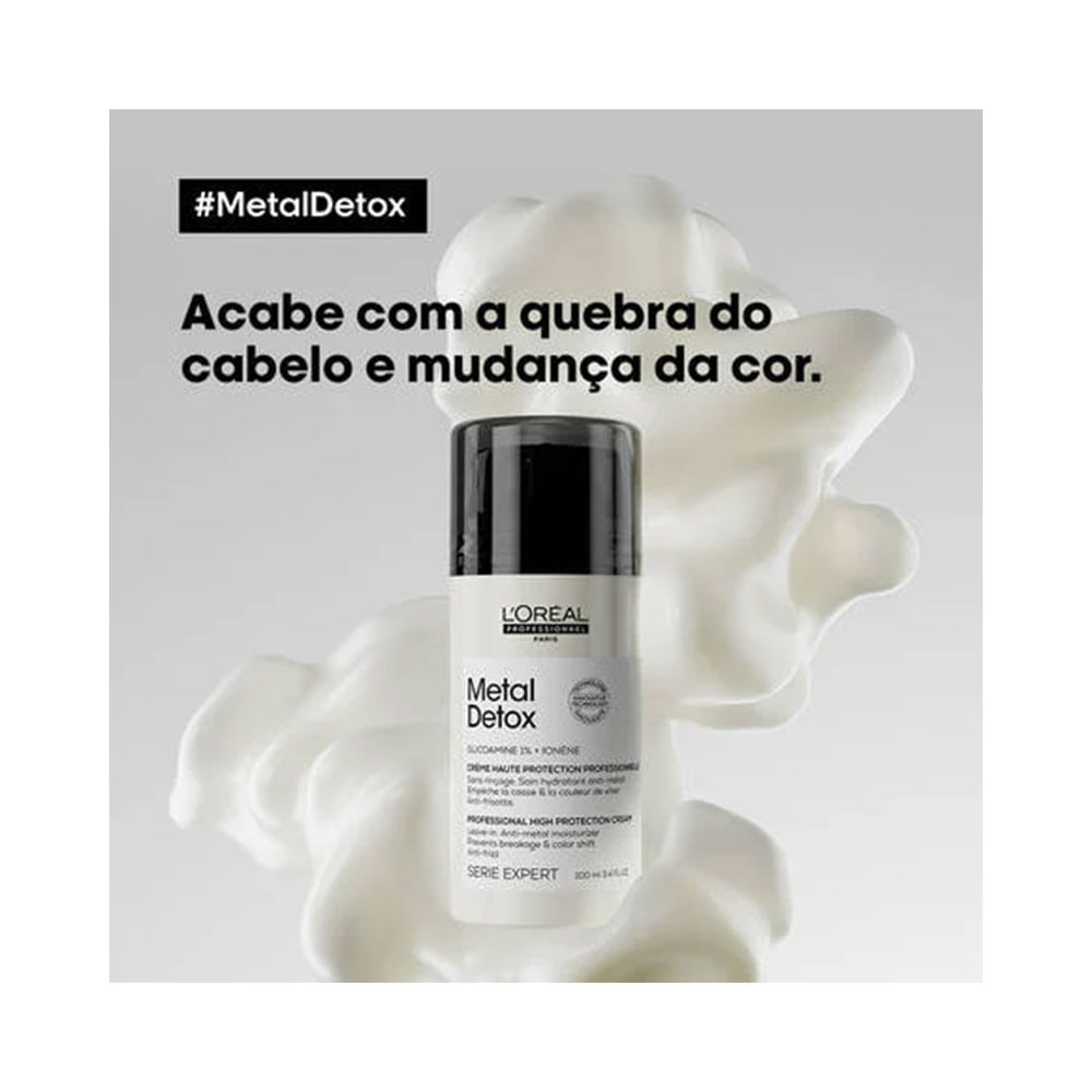 Frasco do Leave-In Metal Detox sobre textura cremosa, destacando proteção contra quebra e mudança de cor