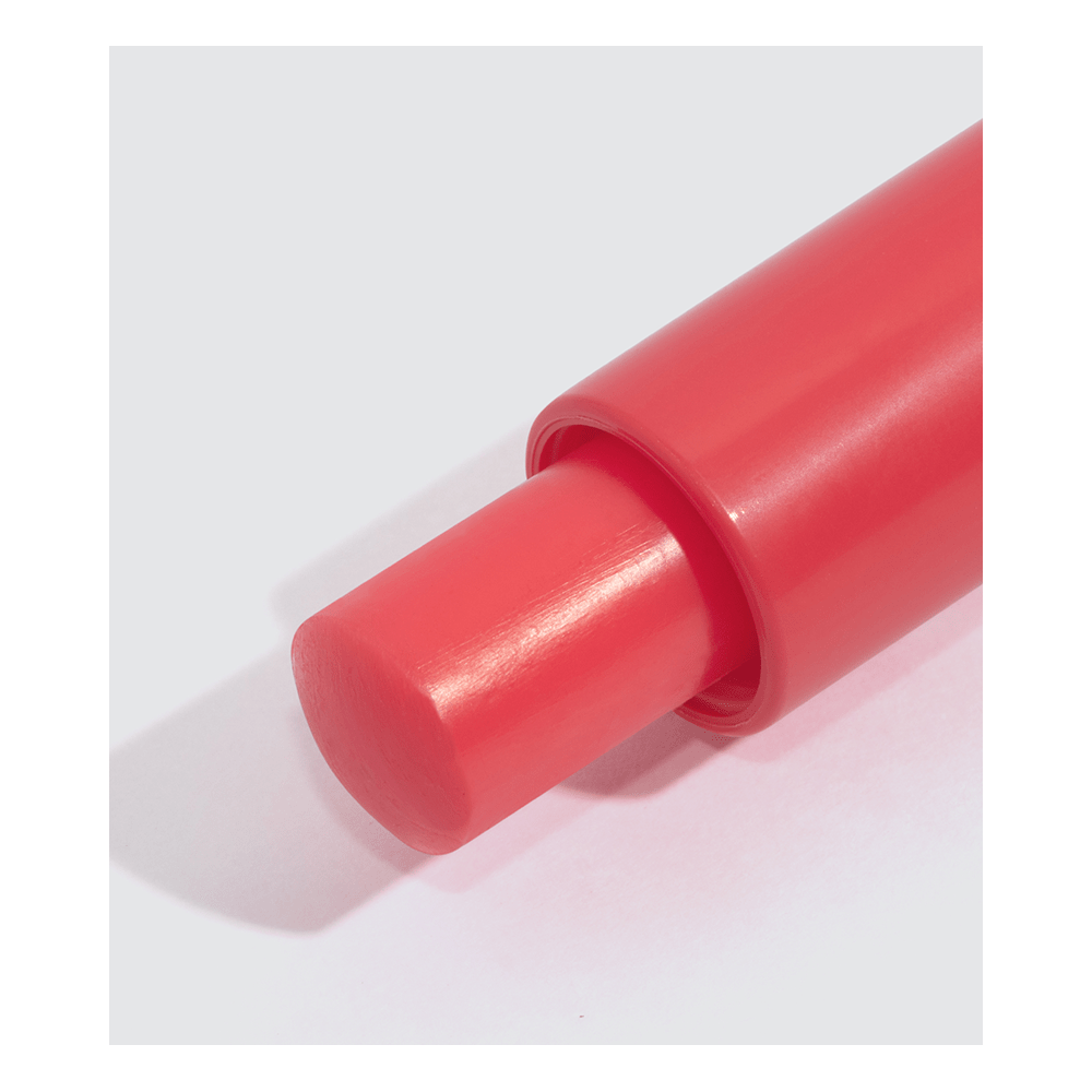 Bastão do Lip Scrub Dailus FPS8 Cereja mostrando textura e formato