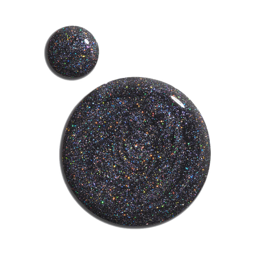 Gotas do esmalte Dailus Babado e Gliteria mostrando partículas holográficas e brilho