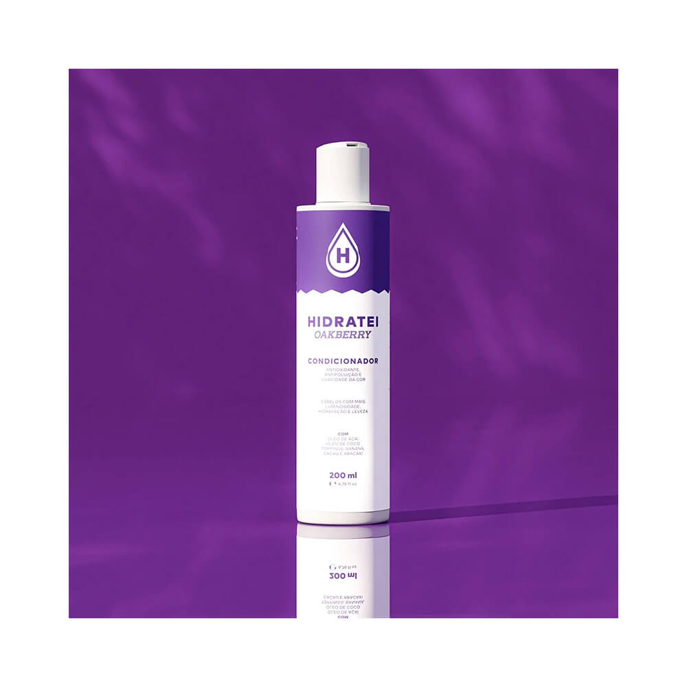 Condicionador Hidratei Oakberry 200ml sobre superfície roxa destacando embalagem