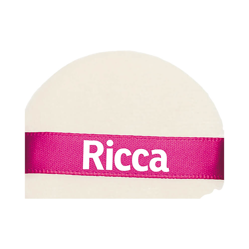 Detalhe da esponja Ricca Puff Médio mostrando textura e faixa rosa