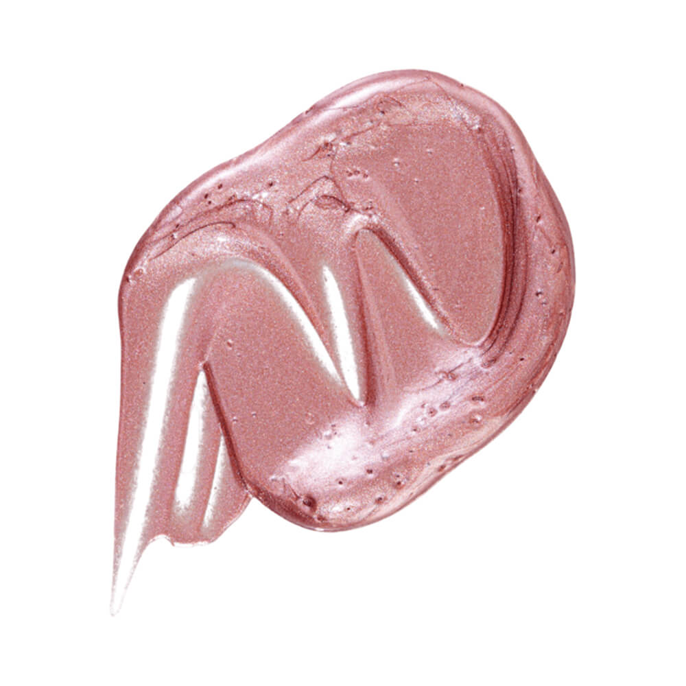 Close na textura cremosa do Iluminador Bauny Soft Glow Sunny mostrando brilho rosado perolado