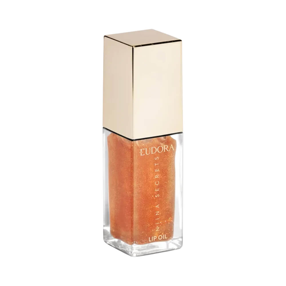 Frasco fechado do Lip Oil Niina Secrets com tampa dourada