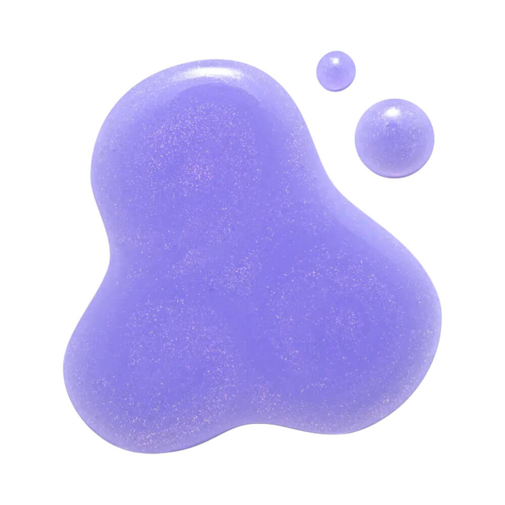 Close em gotas do produto Finalizador Truss Blond Revolution 100ml, líquido roxo translúcido com brilho perolado