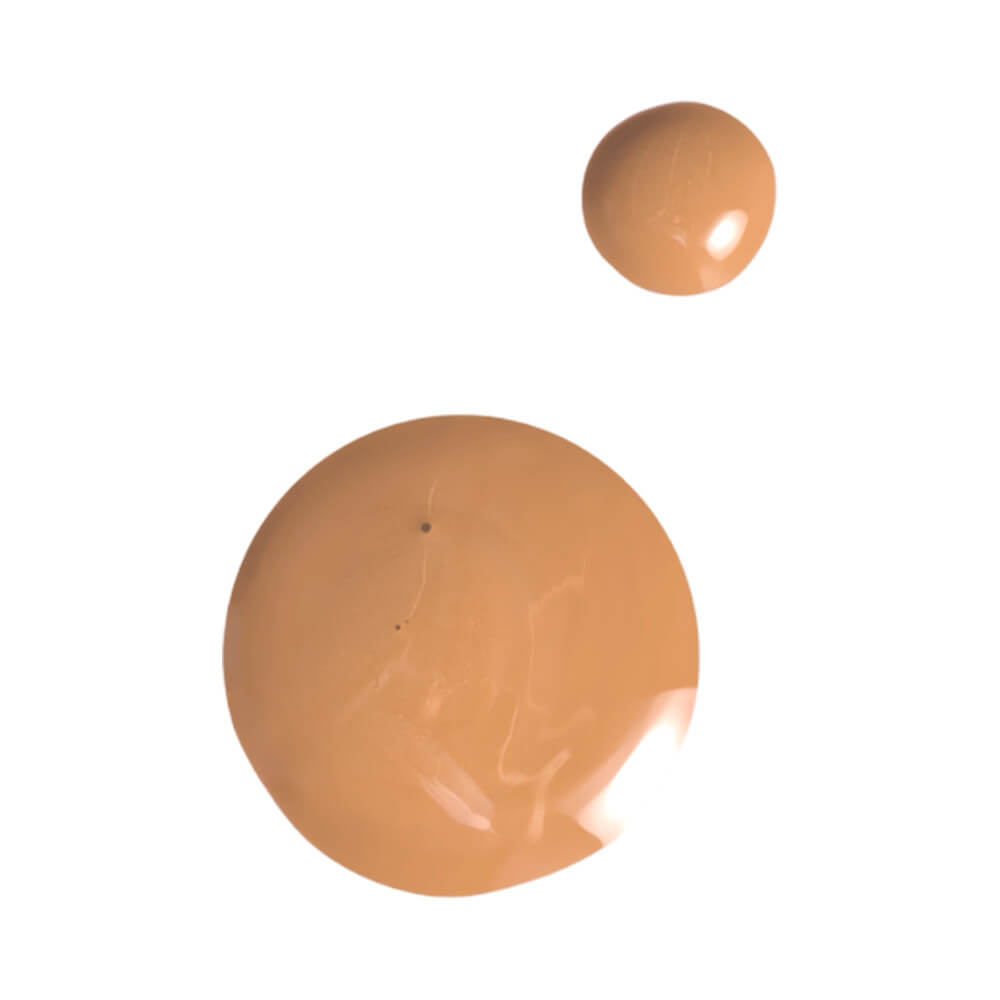 Gotas da Base Melu Foundation Tint cor 90 mostrando textura cremosa e acabamento levemente brilhante