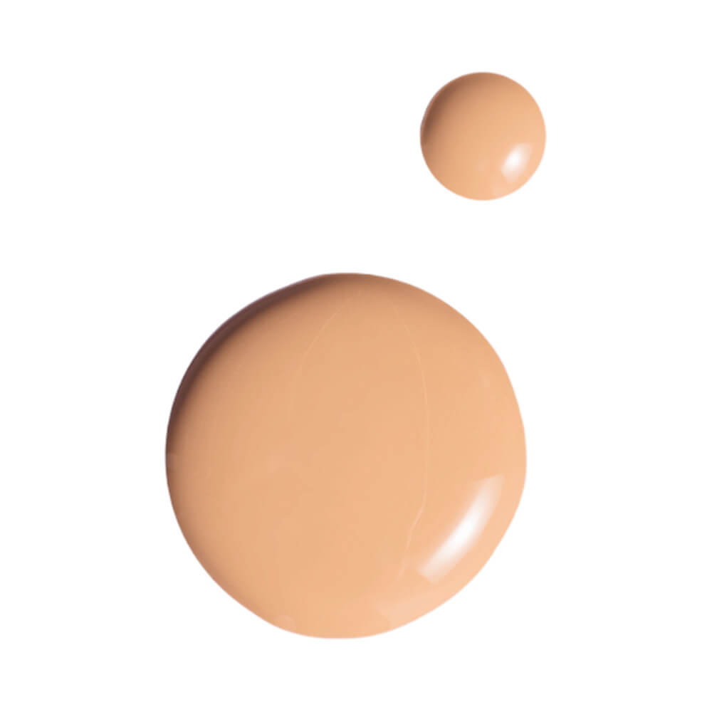 Duas gotas da base líquida Melu Foundation Tint 70, mostrando cor bege claro com acabamento cremoso e luminoso.