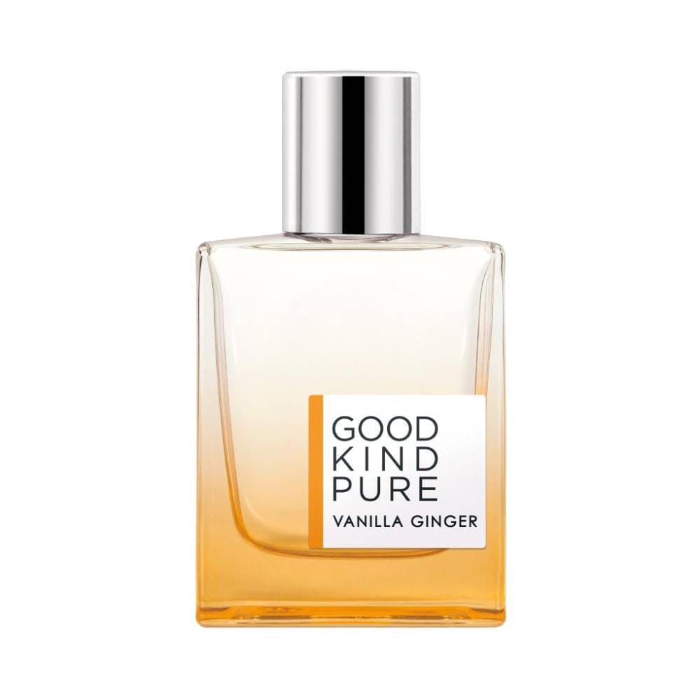Frasco de perfume quadrado com vidro transparente que apresenta um degradê do âmbar na base para transparente no topo, tampa metálica prateada, etiqueta frontal branca com texto preto destacando GOOD 