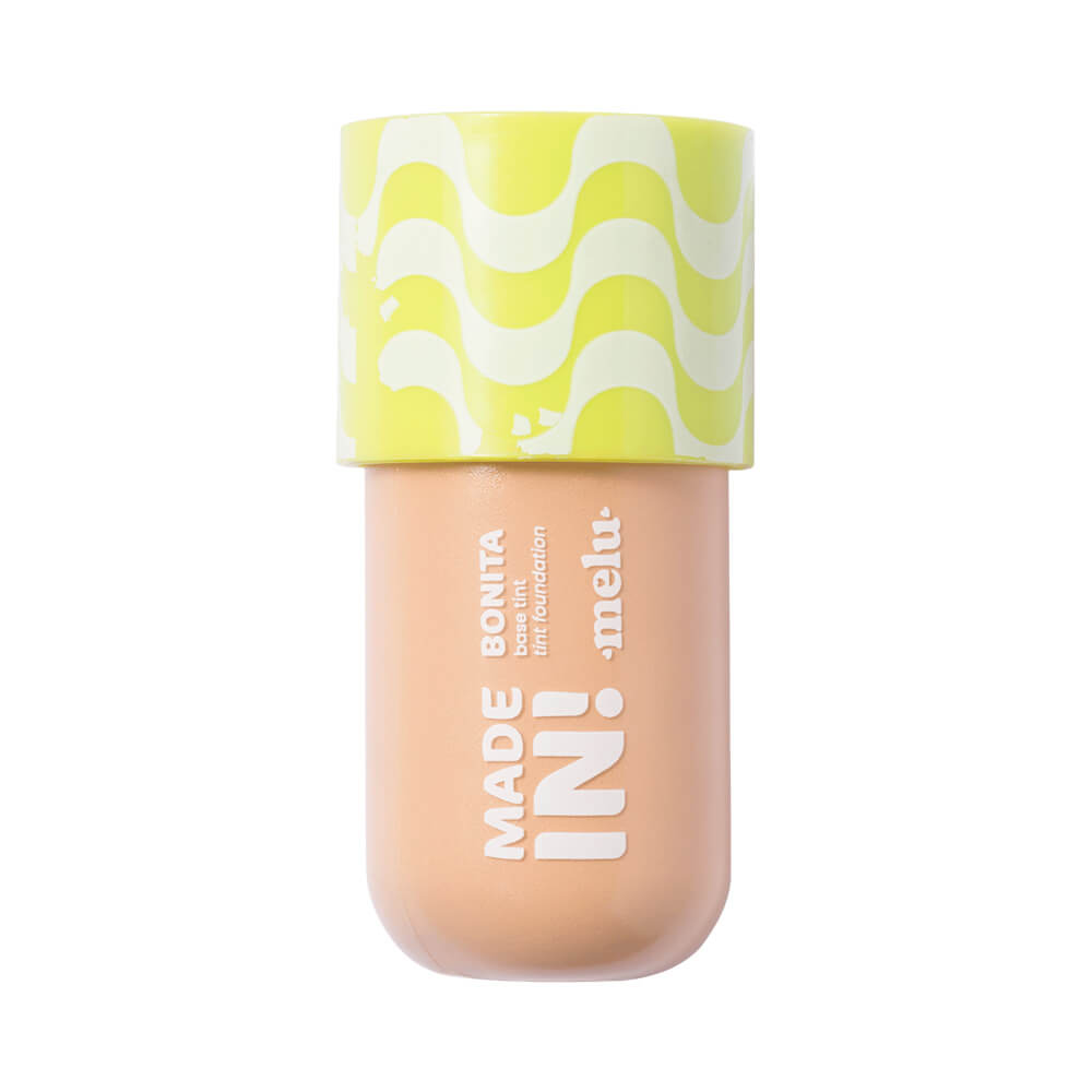 Base líquida Melu Made In! Foundation Tint 60 com embalagem compacta bege e tampa amarela