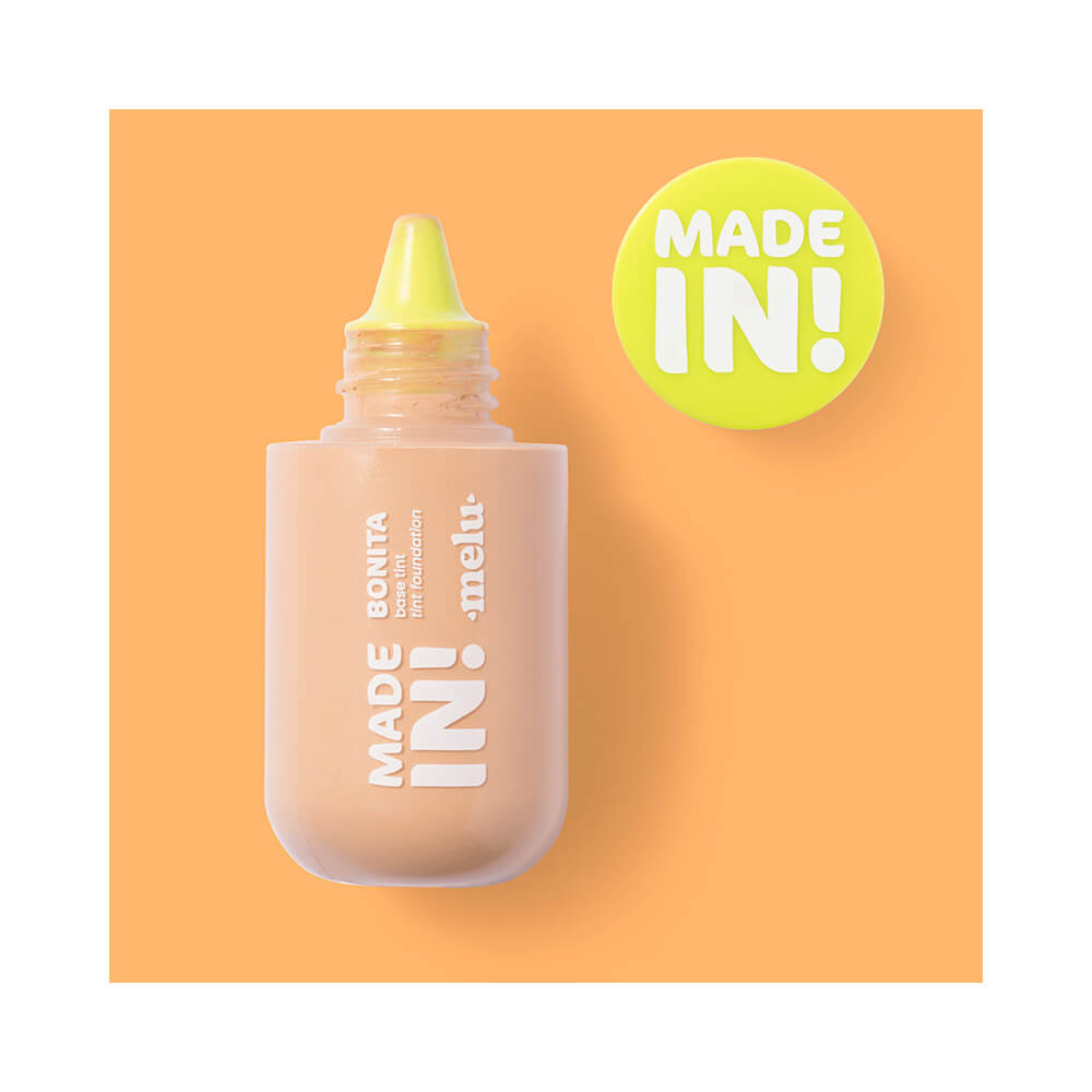 Detalhe do bico aplicador amarelo da base Melu Made In! Foundation Tint 60