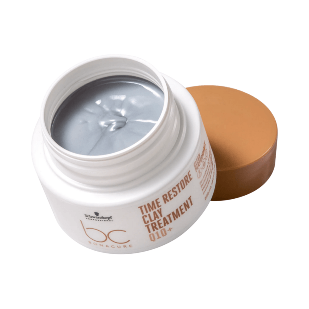 Pote aberto mostrando creme cinza da Máscara Bonacure Time Restore