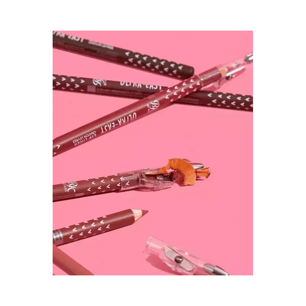 Vários lápis RK by Kiss cor Wine com apontador em uso