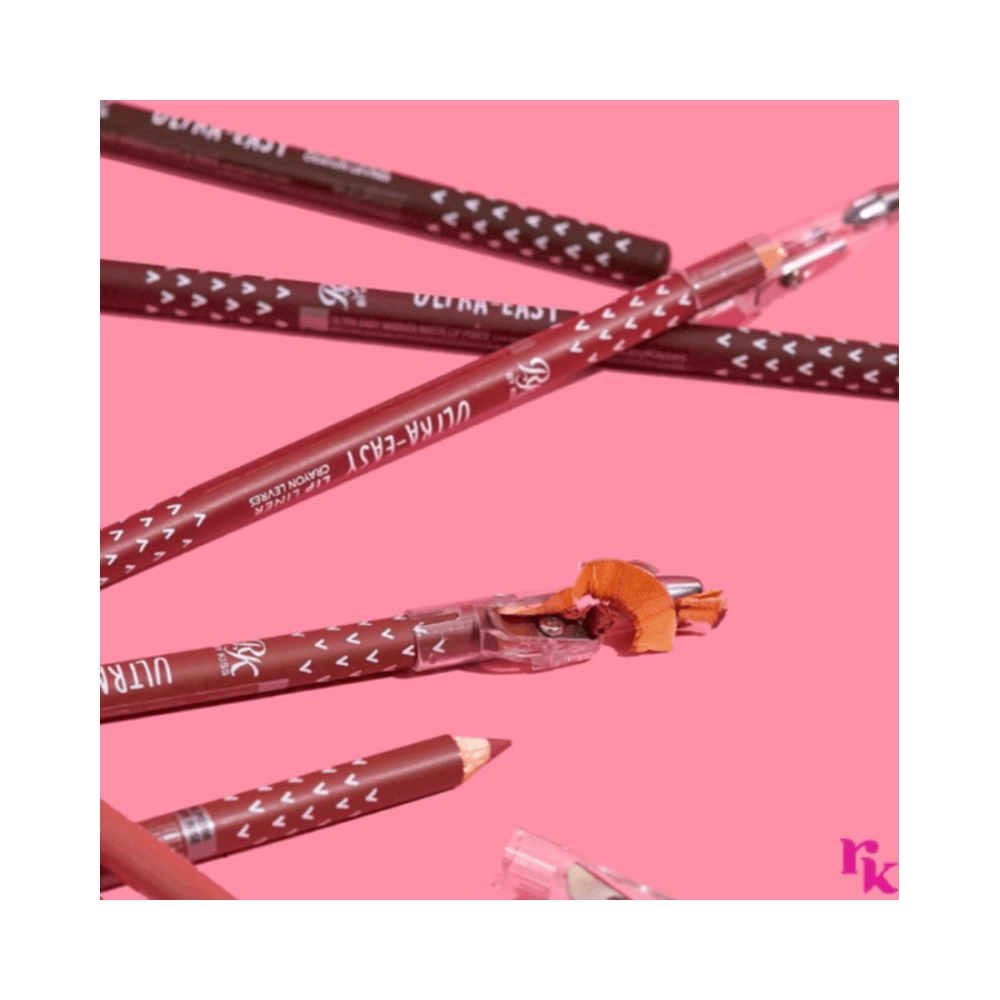 Vários lápis RK By Kiss Nude Rose dispostos mostrando tampas transparentes e pontas nude rosadas