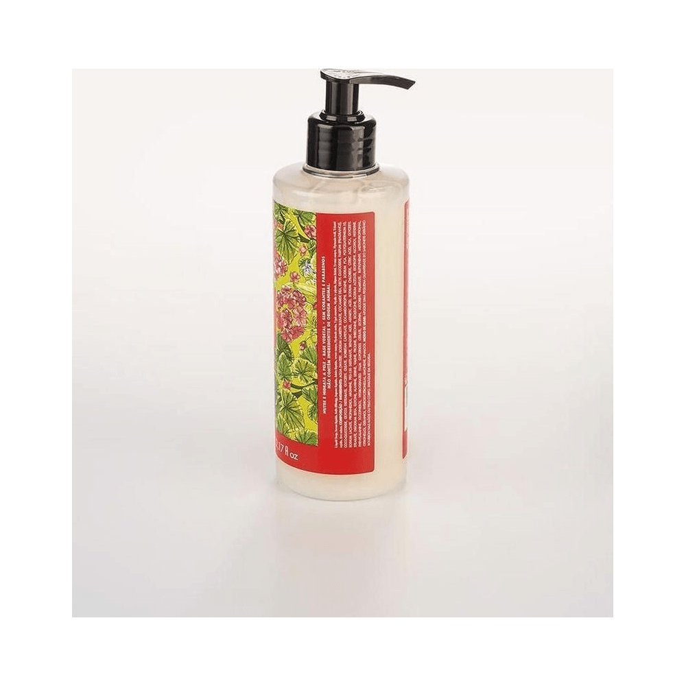 Lateral do frasco mostrando o líquido perolado e o rótulo detalhado