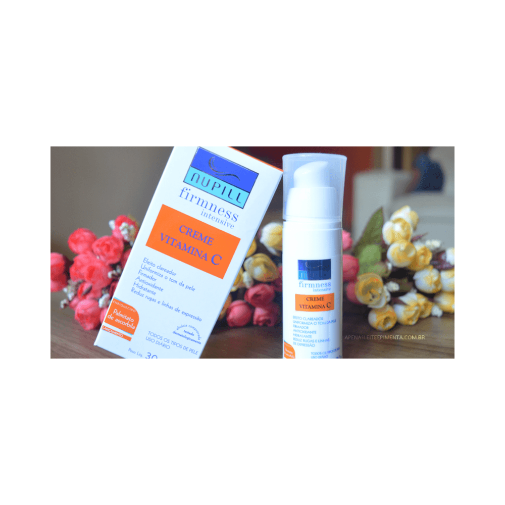 Creme Nupill Vitamina C 30g em ambiente com flores ao fundo