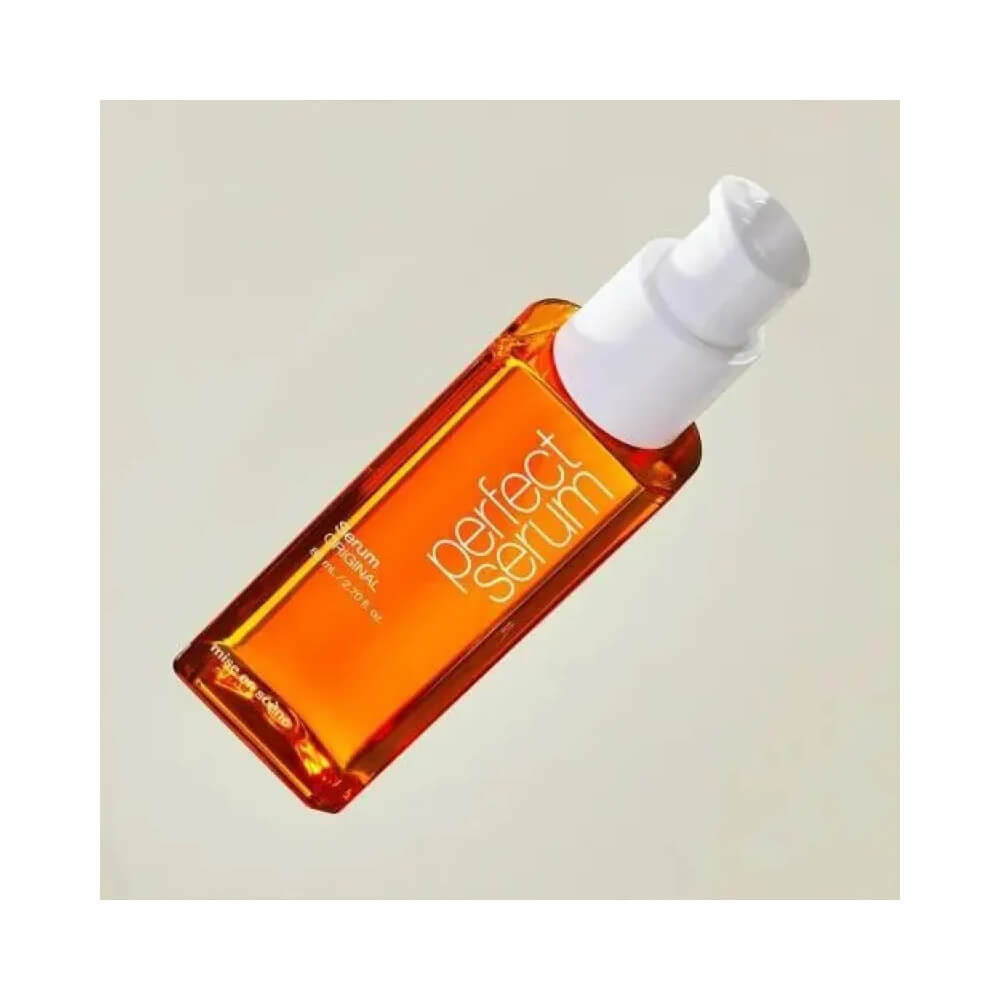 Frasco laranja do Sérum Capilar Mise en Scène Perfect Serum Original com aplicador pump