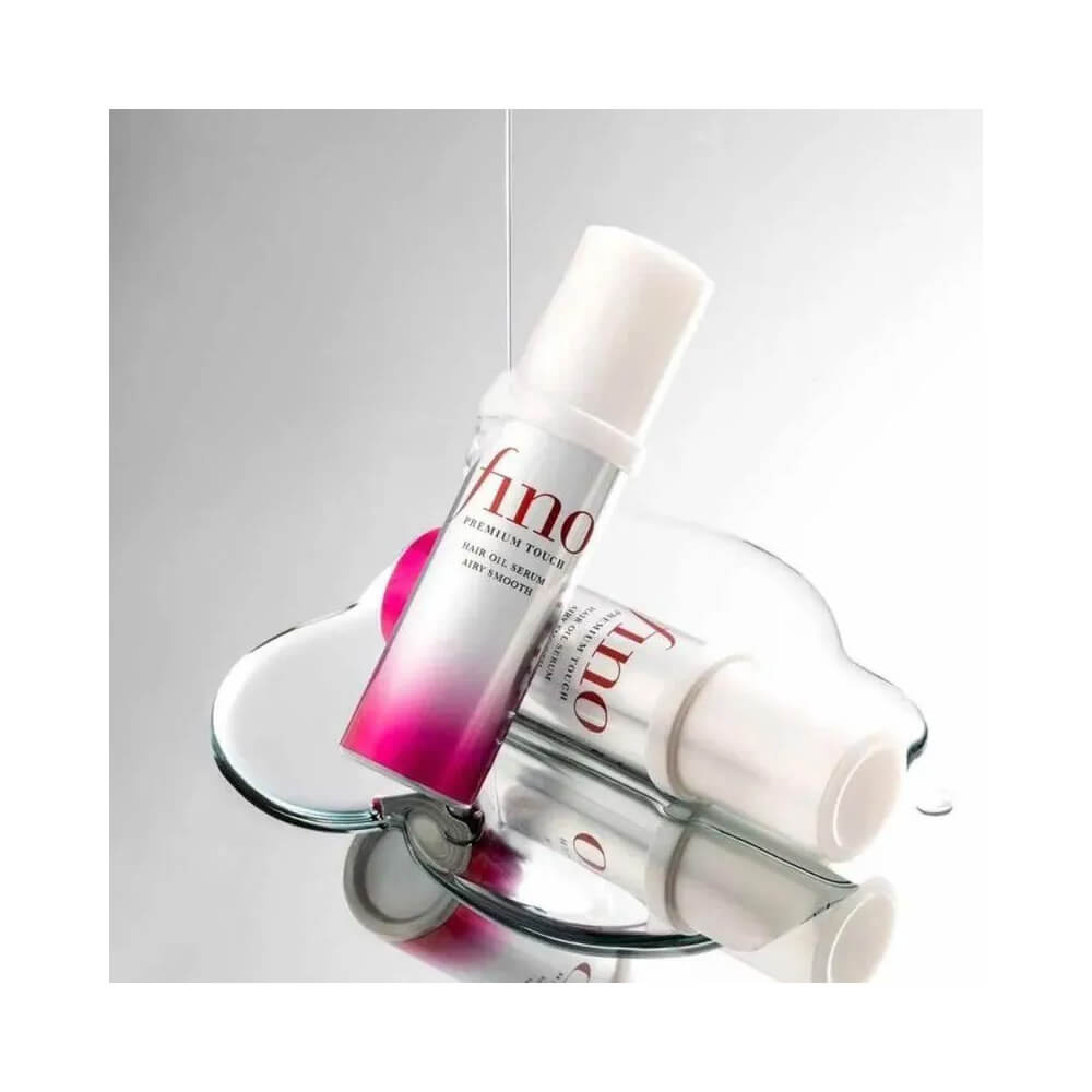 Frascos do óleo capilar Fino Touch Hair Oil Serum exibindo brilho e textura leve