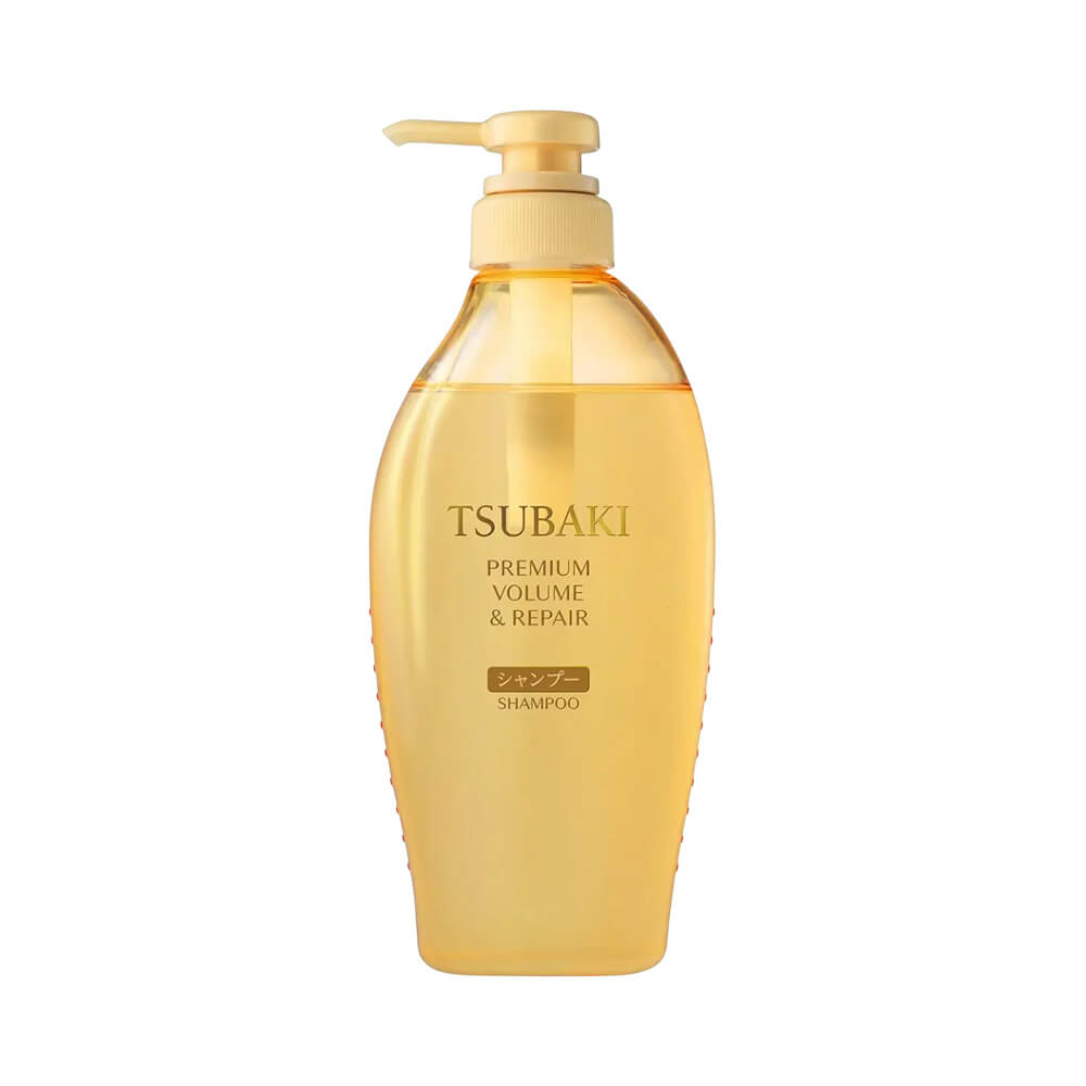 Frasco frontal do Shampoo Tsubaki Premium Volume & Repair 450ml com bico dosador dourado.