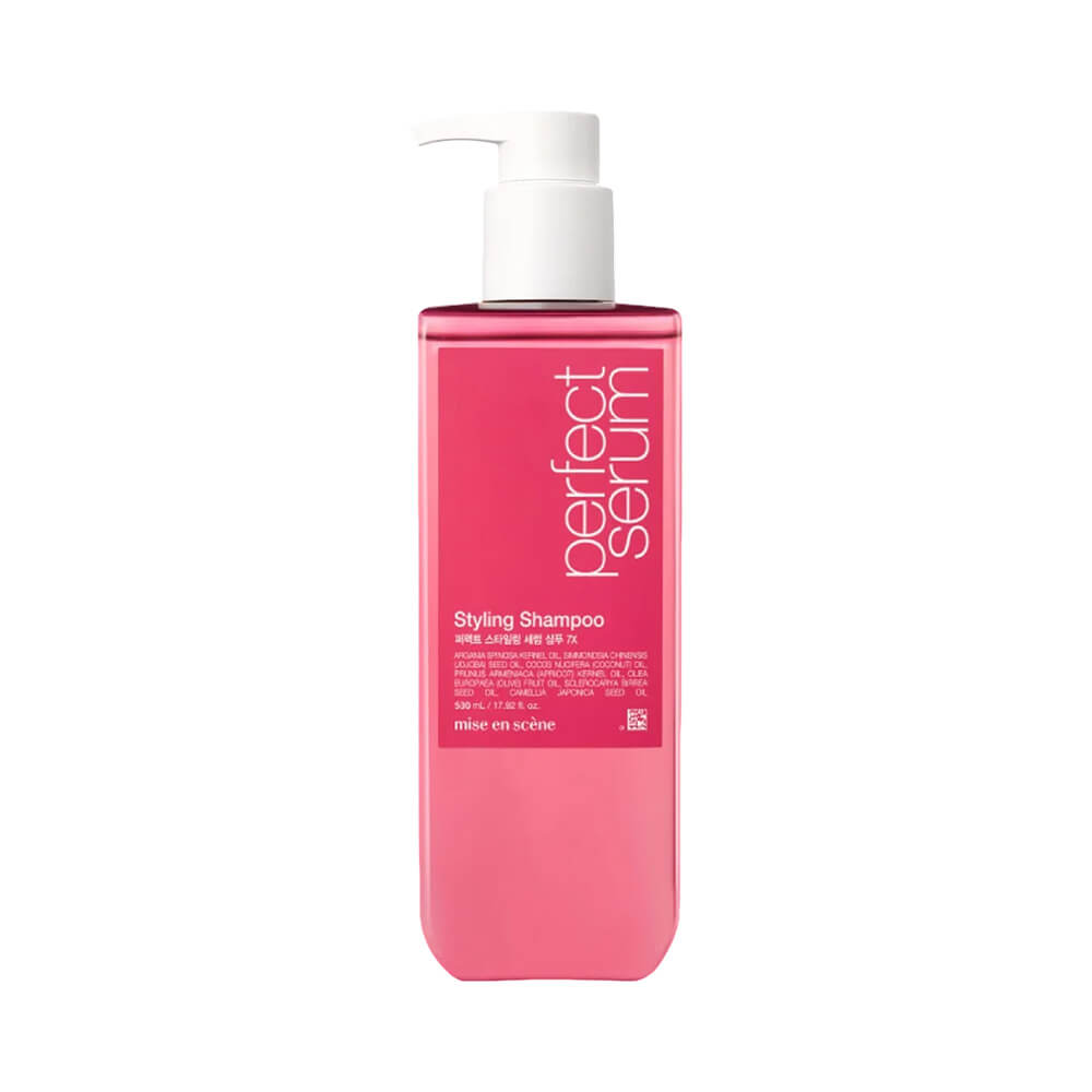 Frasco de Shampoo Mise en Scène Perfect Serum Styling 530ml com acabamento translúcido rosa e pump branco