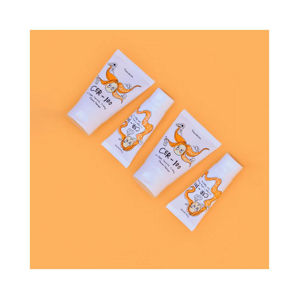 Quatro tubos do Leave-In Elizavecca Cer-100 Ion Injection sobre fundo laranja