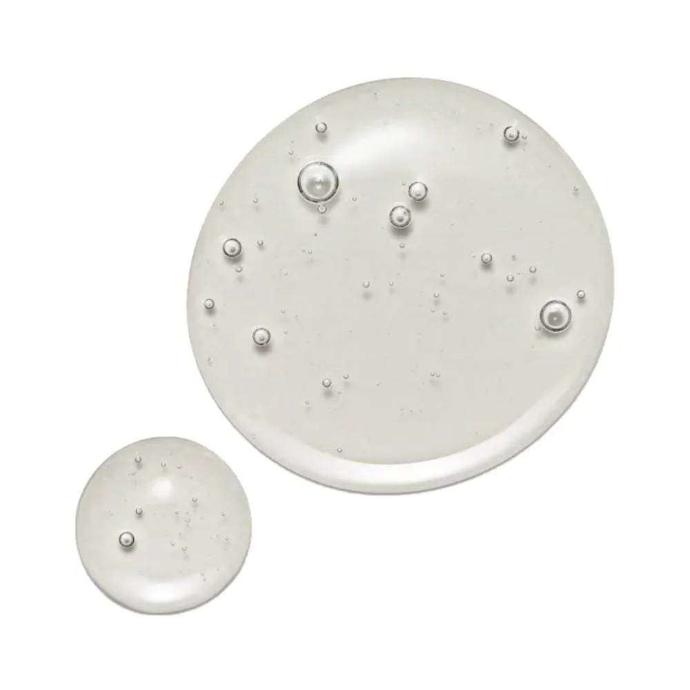 Textura gelatinosa e transparente do shampoo Truss Nutri Infusion com bolhas de ar