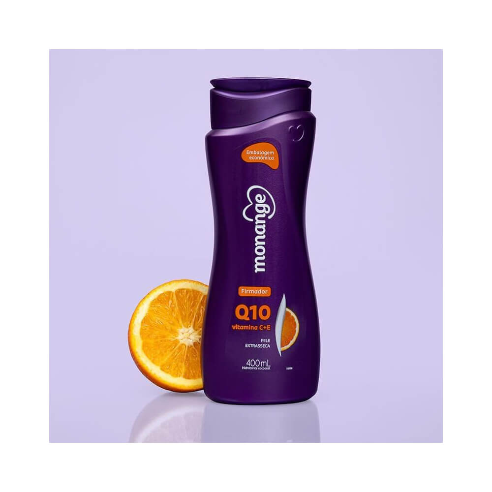 Frasco do hidratante Monange Q10 ao lado de uma metade de laranja