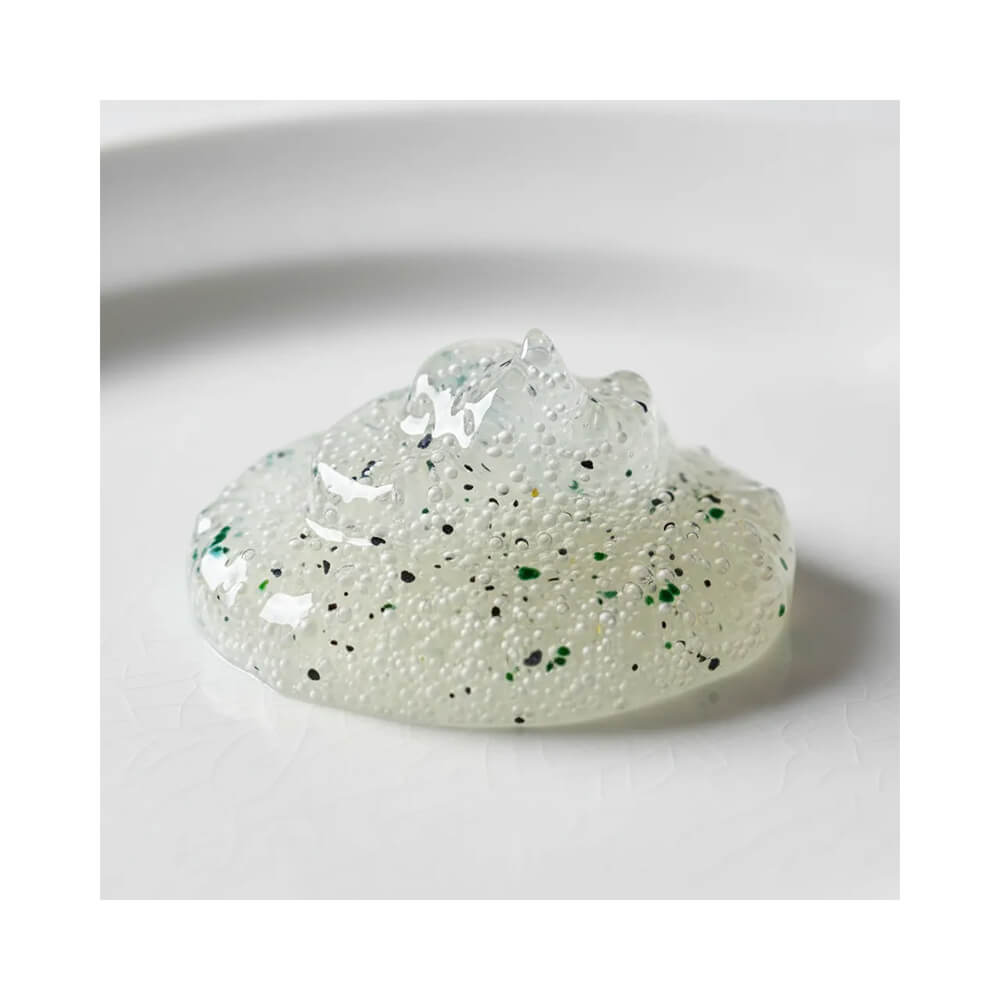 Textura do Gel Esfoliante Facial D'agua Natural Vita Faces Iluminador Detox mostrando micropartículas esfoliantes