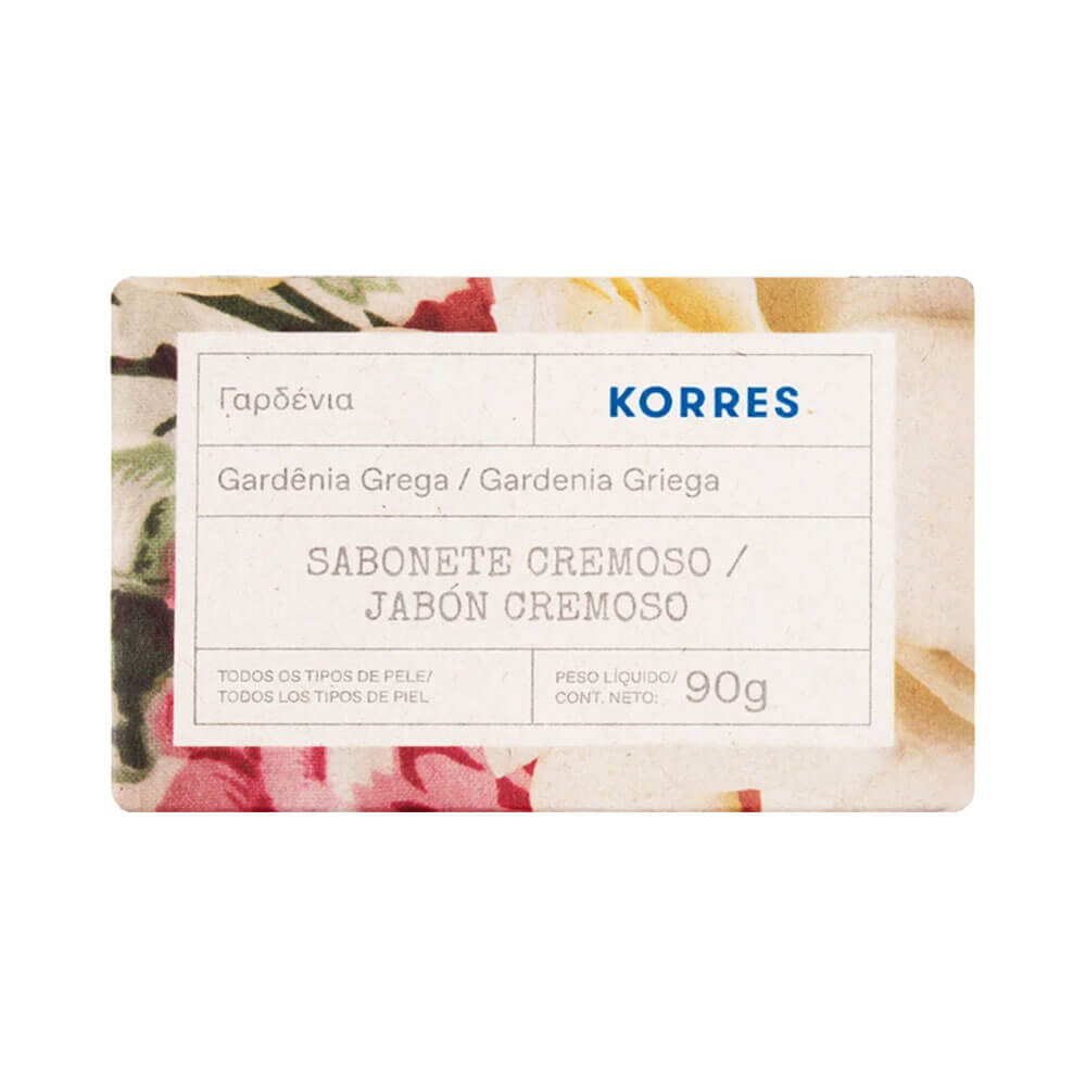 Embalagem frontal do Sabonete Korres Gardênia Grega 90g com design floral e informações do produto.