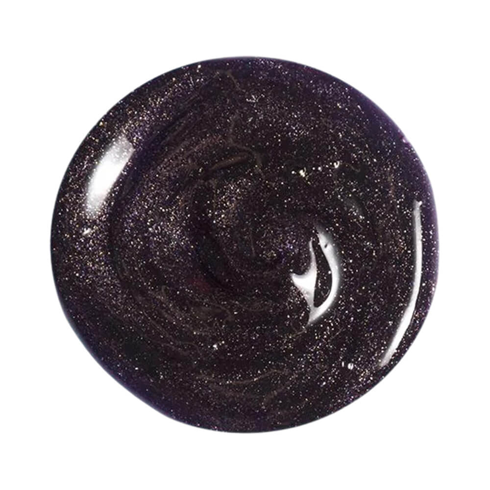 Close do gloss Melu Luluca Magic Violet mostrando textura brilhante e cor roxa escura com glitter prateado