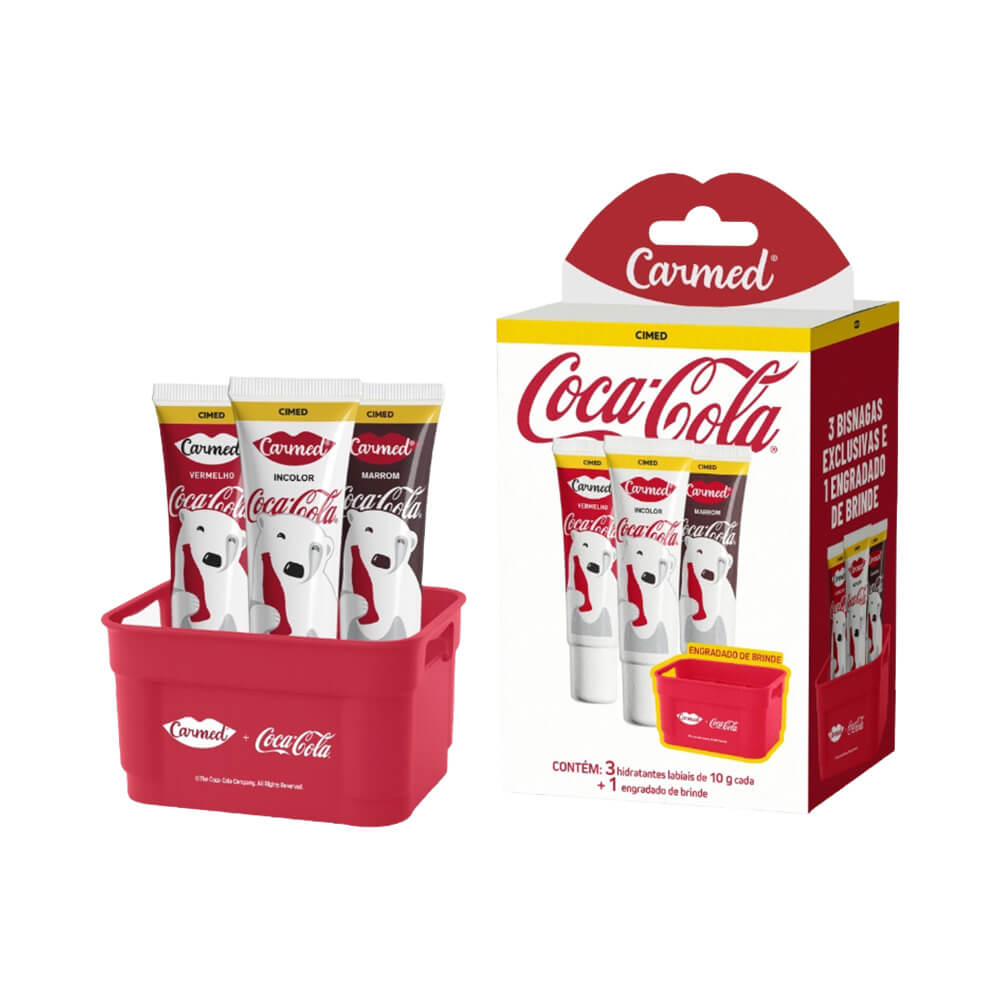 Kit Carmed Coca-Cola com três hidratantes e engradado colecionável em fundo branco.