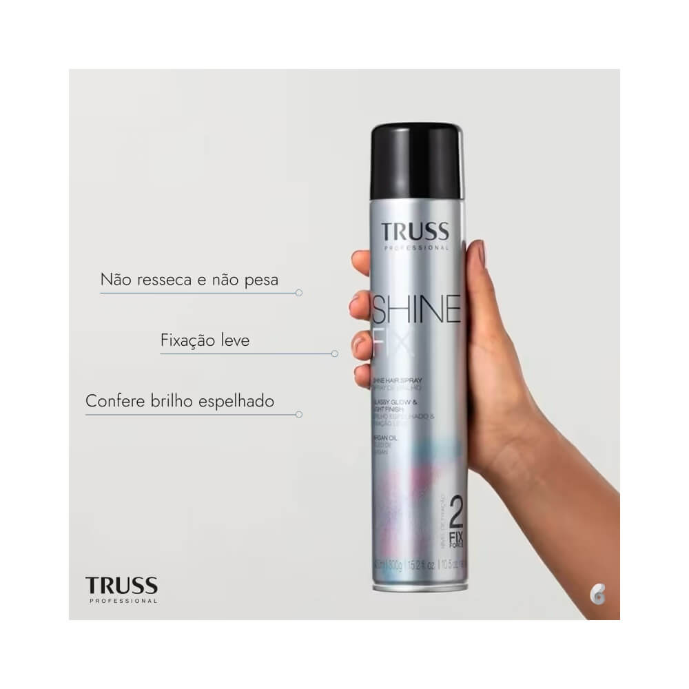 Hair Spray Truss Shine Fix 450ml sendo segurado por uma mão