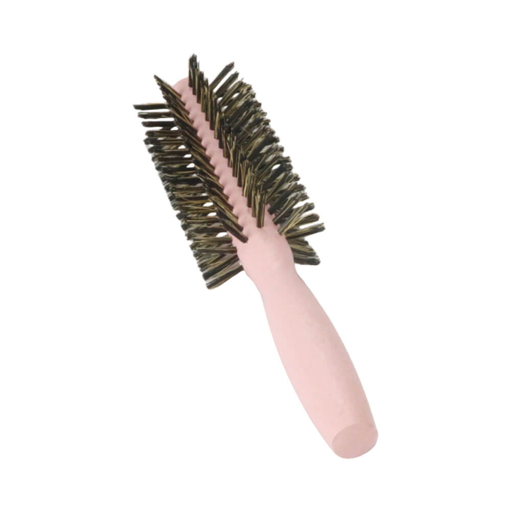 Detalhe da escova Marilú Meia Lua com cabo rosa e cerdas mistas pretas