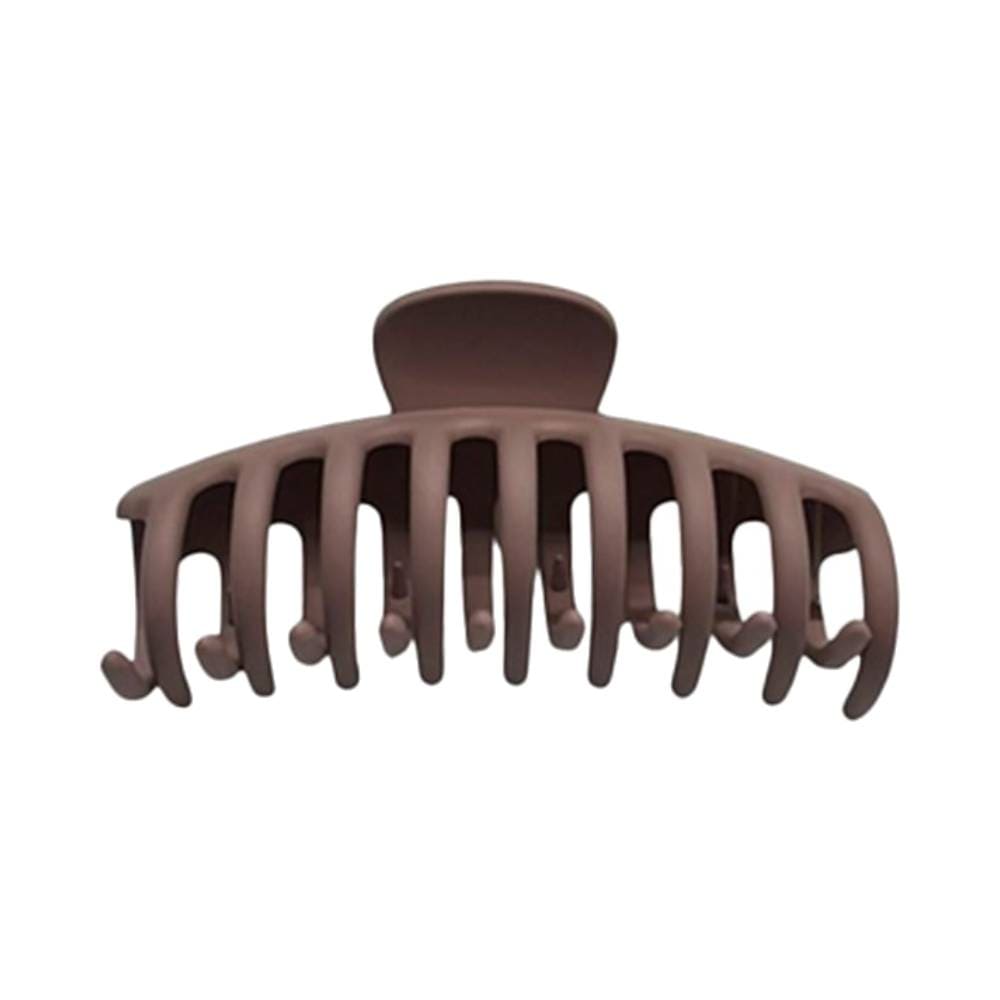 Prendedor de cabelo grande The Pro Cote Matte Nude G com acabamento fosco e dentes largos curvados para melhor fixação.