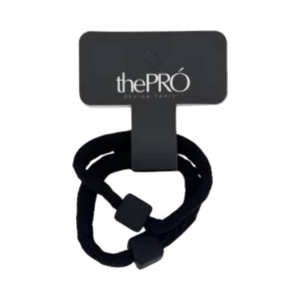 Elásticos de cabelo pretos The Pro Vogue 03 fixados em cartão preto com marca thePRÓ