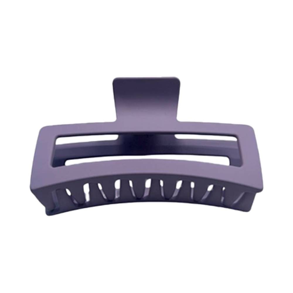 Prendedor de cabelo violeta fosco visto de frente sobre fundo branco