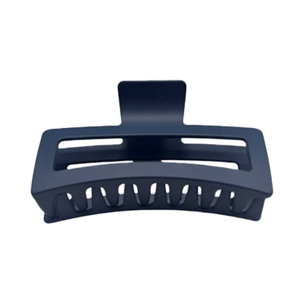 Prendedor de cabelo grande azul fosco The Pro Carre Matte Blue, formato retangular com dentes internos para segurar o cabelo.