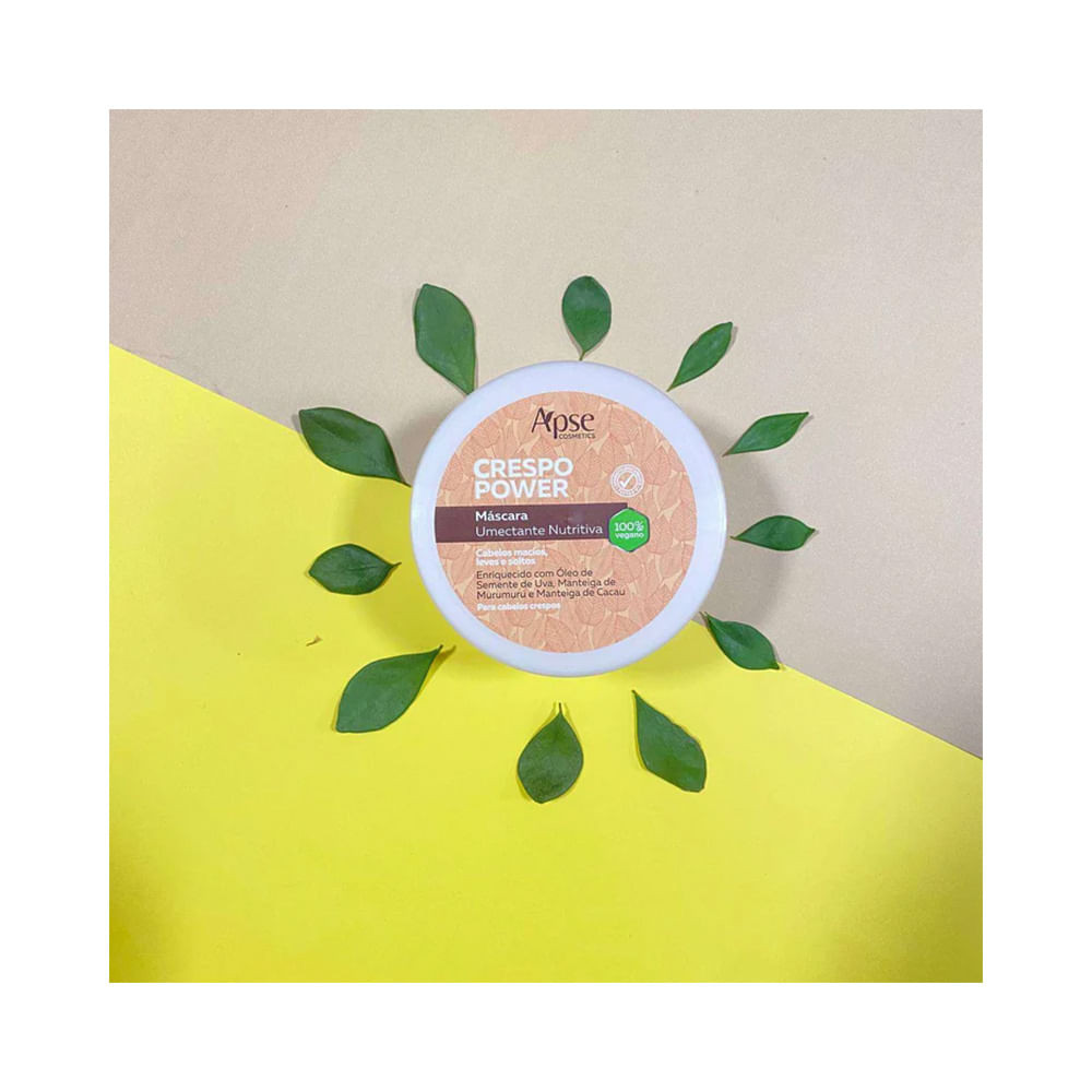 Vista superior da Máscara Capilar Apice Crespo Power Umectante Nutritiva com folhas verdes ao redor